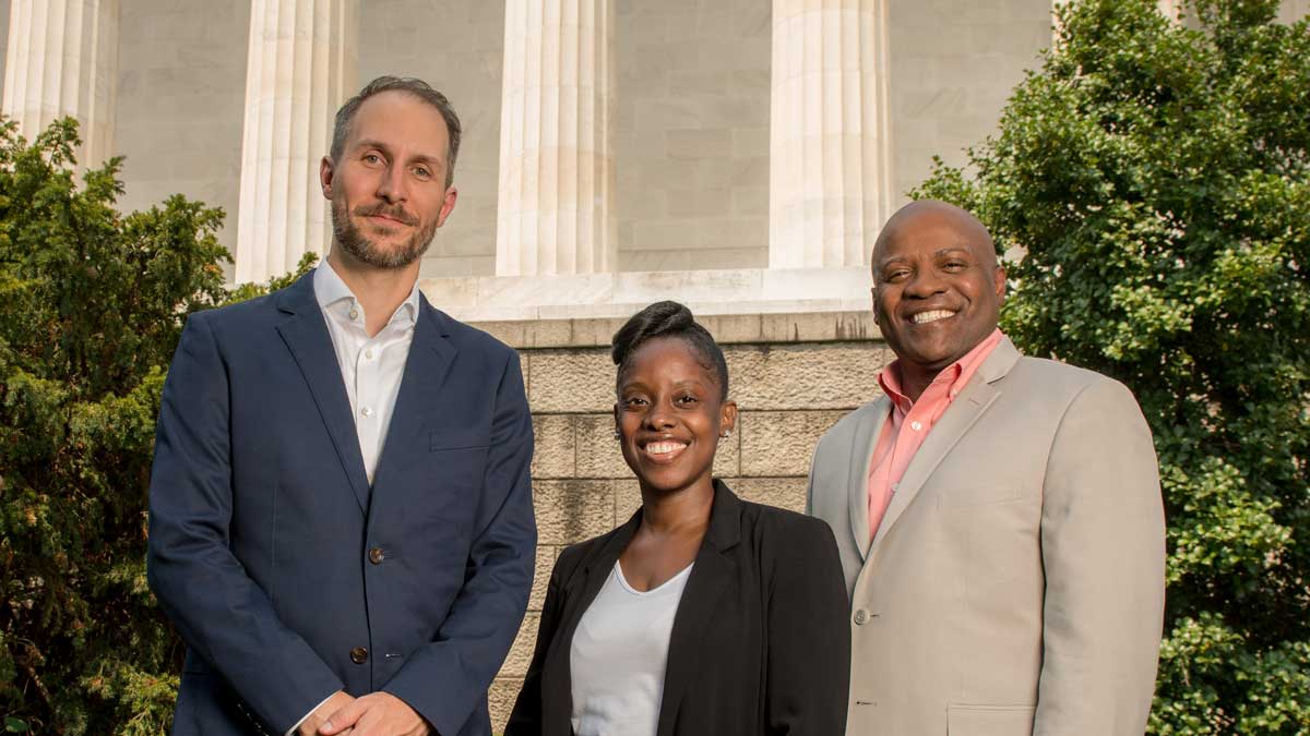 Ryan E. Jones, Michelle Daniels, Charles D. Eldridge headshot